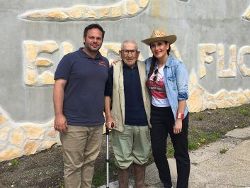 Winemaker Elena Fucci with her husband, Andrea Manzani (left), and grandfather Generoso at her "bio-architecture" winery.                                                                (Robert Camuto)