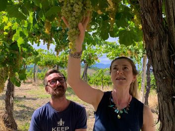 Siblings Cristiana Tiberio and Antonio Tiberio inspect one of their old pergola-trained Trebbiano Abruzzese vines.                                                                (Robert Camuto)