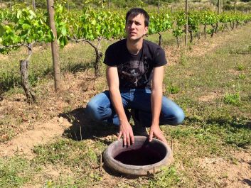 Eduard Pie Palomar with a vineyard amphora he uses for outdoor fermentations                                                                 (Robert Camuto)