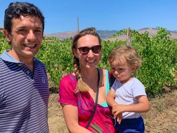 Michele and Claudia Calabretta, with son Marco, are juggling three kids, their original careers and developing their vineyards and new wine label, Tenuta Boccarossa.                                                                (Robert Camuto)