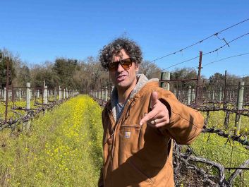 Arbe Garbe-Enrico Bertoz standing in Catie's Corner Vineyard